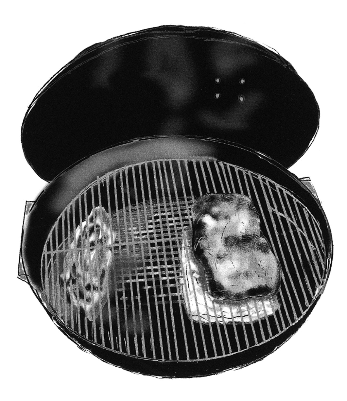 Figure 2-2:  Keep your meat out of the direct line of the heat source when you use your charcoal grill as a smoker.